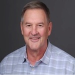 Larry B. Friis, D.B.A